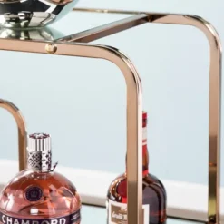 Kirkland's Home Kitchen Islands & Bar Carts-Gold Curved Metal Mirrored Bar Cart