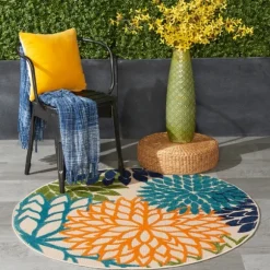 Kirkland's Home Outdoor Rugs-Tangerine Floral Burst Round Outdoor Area Rug